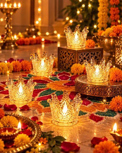 Crown candles placed among diyas and rangoli for royal Diwali table styling – Craft Decor